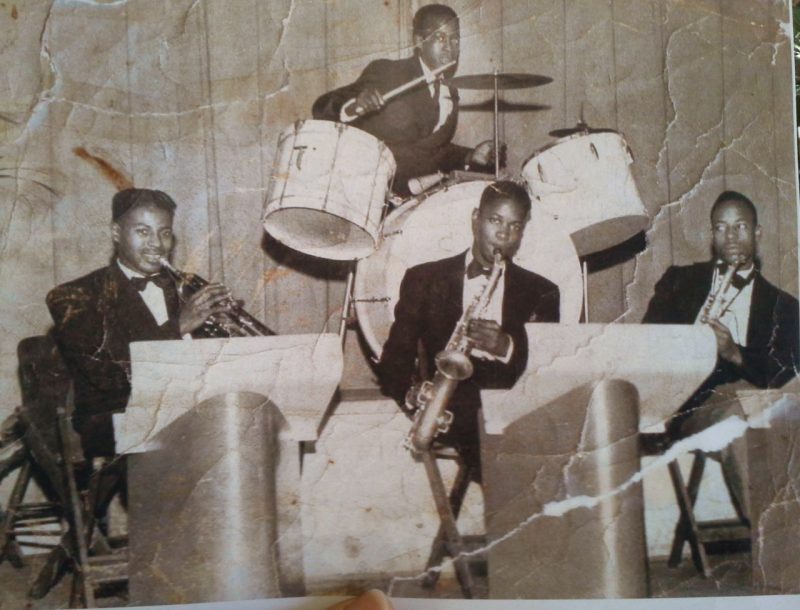 Young Irving Fuller with band members